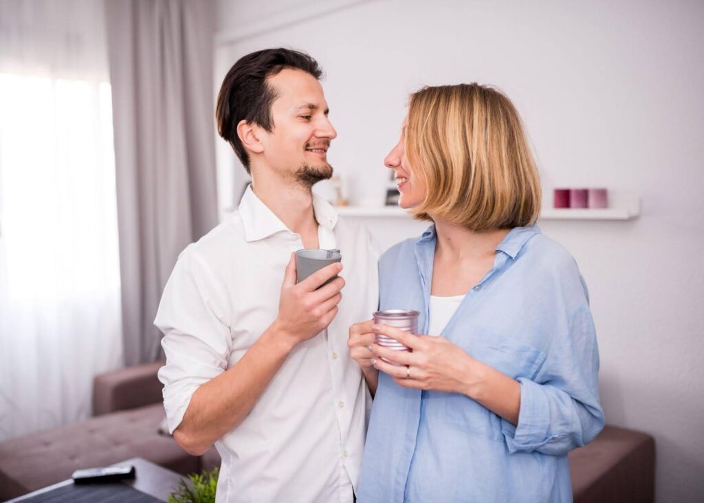 Smiling married couple showing emotional connection and trust.