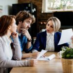 A lawyer conducting a legal separation mediation process for a young couple.
