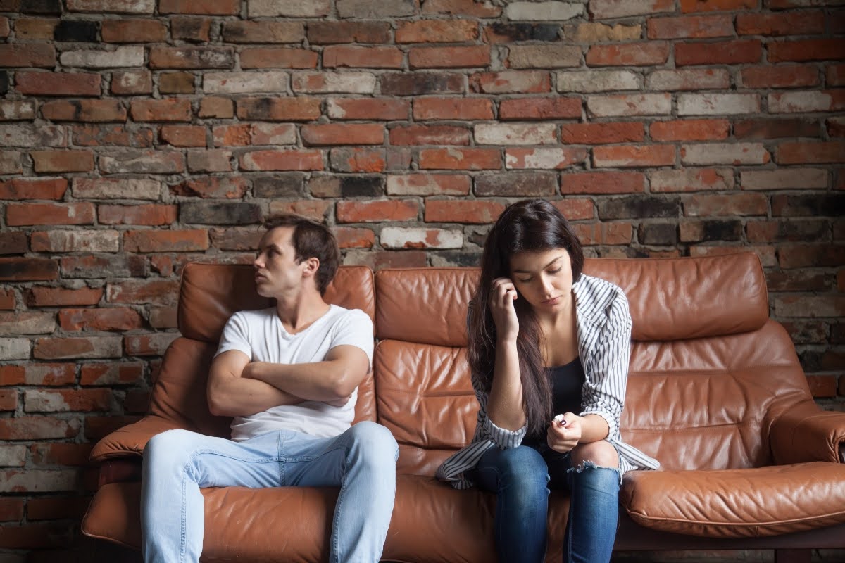 Upset couple going through family law mediation. 